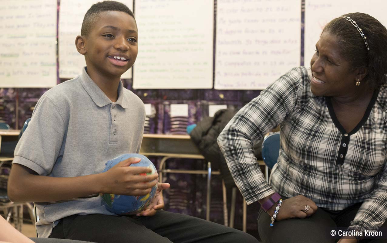 A student and a staff developer in a C Squad circle 