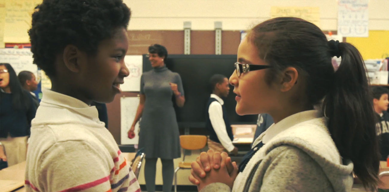 Two students doing a pair share in a classroom
