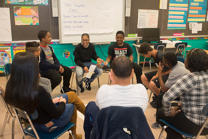 Middle school students in a circle