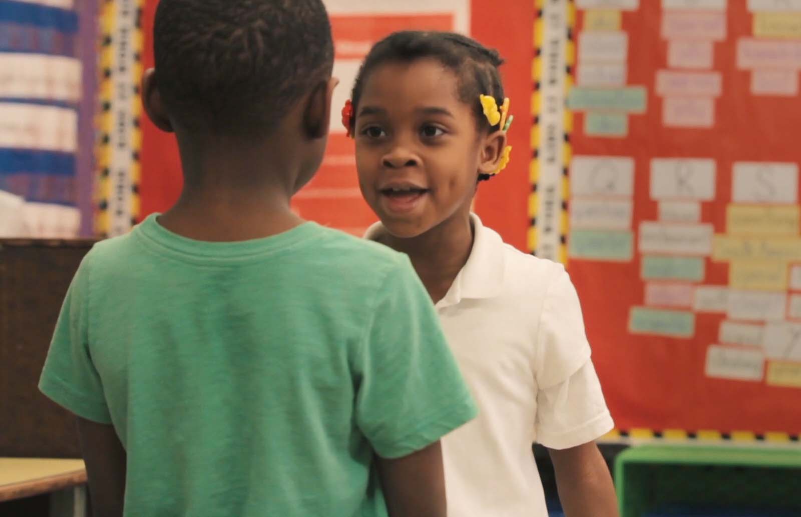Two students participating in a 4Rs roleplay.