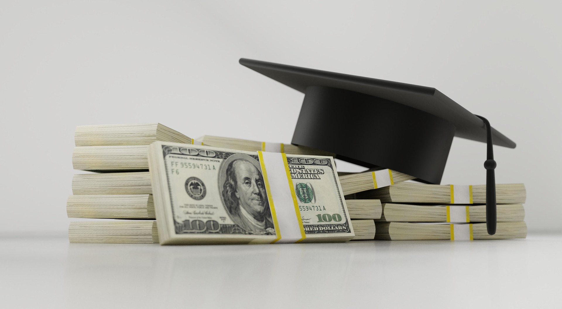 Image of money and graduation cap